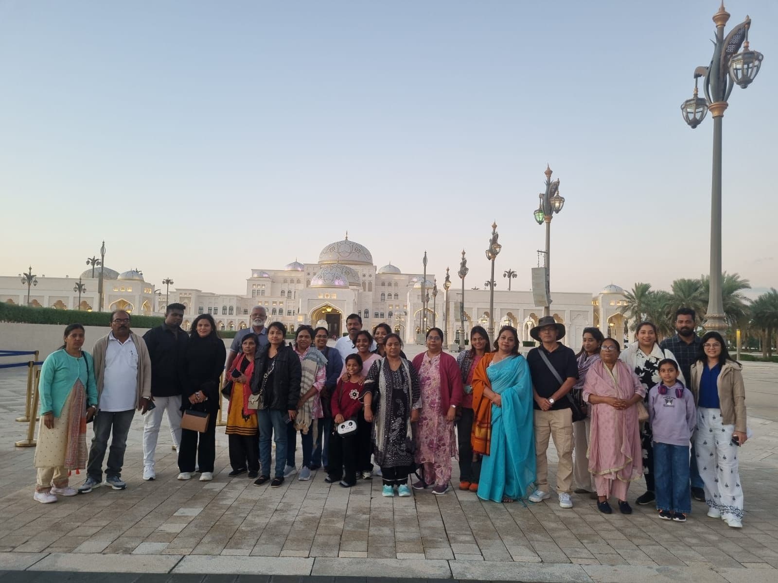 Family tour group at sunset